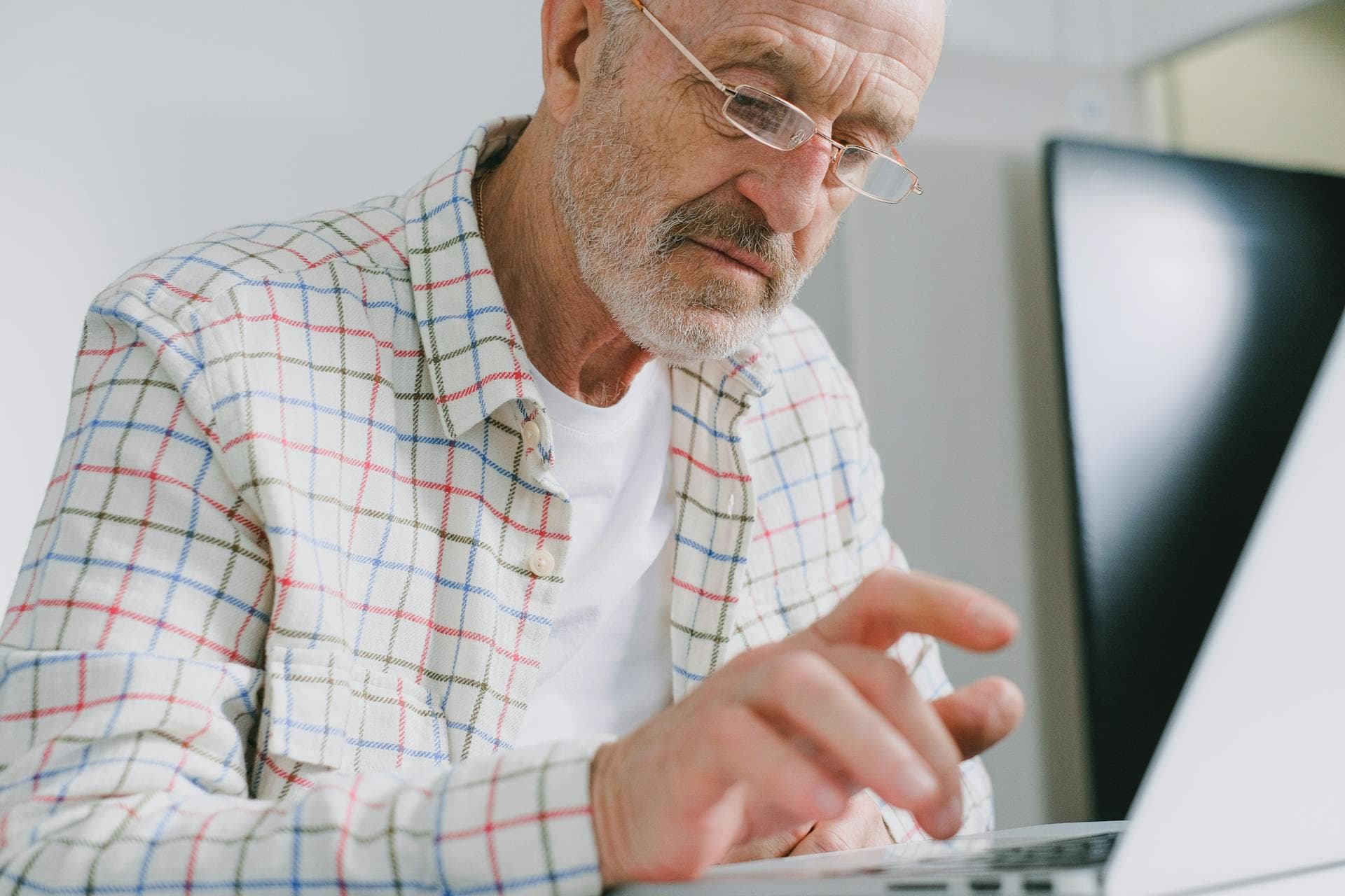 Man working on a laptop at a desk